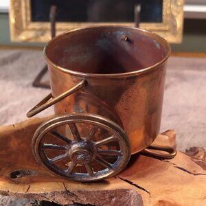 Vintage Copper pot on wheels